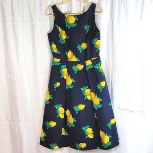 Lady dress  New York and co size 6 dark blue with beautiful yellow flowers